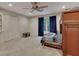 Large bedroom with window, ceiling fan, closet, and space for desk and bunkbeds at 3028 Towneside Ln, Woodstock, GA 30189