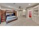 Large bedroom with bunkbeds, a ceiling fan, carpet, and built in shelving at 3028 Towneside Ln, Woodstock, GA 30189