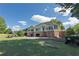 Spacious clubhouse with golf cart parking, perfect for a day on the greens at 3028 Towneside Ln, Woodstock, GA 30189