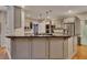Modern kitchen featuring granite countertops, stainless steel appliances, and ample cabinet space at 3028 Towneside Ln, Woodstock, GA 30189
