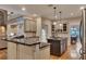 Well-equipped kitchen featuring a large island, stainless steel appliances, and an open layout at 3028 Towneside Ln, Woodstock, GA 30189