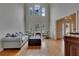 Bright living room with hardwood floors, large windows, and a comfortable seating area at 3028 Towneside Ln, Woodstock, GA 30189