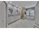A bright main bathroom features a double vanity, soaking tub, and separate shower for a spa-like experience at 3028 Towneside Ln, Woodstock, GA 30189