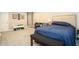 Basement bedroom showcases a bed, closet, and small play area at 4409 Woodward Mill Rd, Sugar Hill, GA 30518