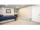 Spacious basement bedroom with carpet, a bed, and a closet at 4409 Woodward Mill Rd, Sugar Hill, GA 30518
