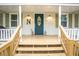 Inviting front porch with a well-decorated entry way and a cozy welcome at 4409 Woodward Mill Rd, Sugar Hill, GA 30518