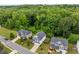 An aerial view of the community and its surrounding trees and homes at 197 Cherokee Reserve Cir, Canton, GA 30115