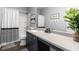 Modern bathroom featuring shower/tub combo, dark cabinetry and a gray color scheme at 197 Cherokee Reserve Cir, Canton, GA 30115