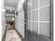 Stylish entryway with decorative molding and modern door, leading to an open living area at 197 Cherokee Reserve Cir, Canton, GA 30115