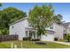 Beautiful home with well-maintained lawn, an attached garage and mature trees at 197 Cherokee Reserve Cir, Canton, GA 30115