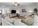 Comfortable living area with stylish decor, large windows, and plenty of natural light at 197 Cherokee Reserve Cir, Canton, GA 30115