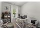 Comfortable office space with natural light, a desk, and ample storage at 197 Cherokee Reserve Cir, Canton, GA 30115
