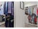 Walk-in Closet featuring multiple shelves and hanging space for clothing and accessories at 197 Cherokee Reserve Cir, Canton, GA 30115