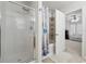 Bathroom featuring a shower and separate soaking tub, as well as an entry to an adjacent Gathering room at 2545 Gatewater Ct, Cumming, GA 30040