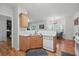 Bright kitchen area featuring stainless steel appliances and hardwood floors at 2545 Gatewater Ct, Cumming, GA 30040