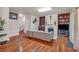 Spacious living room featuring hardwood floors and a built-in entertainment center at 2545 Gatewater Ct, Cumming, GA 30040