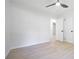 Bedroom with wood flooring, and white walls with view to closet at 2975 Rollingwood Se Ln, Atlanta, GA 30316