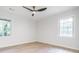 Large bedroom featuring two windows, neutral walls and floor at 2975 Rollingwood Se Ln, Atlanta, GA 30316