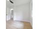 Bedroom with wood flooring, a ceiling fan, a window, and light walls at 2975 Rollingwood Se Ln, Atlanta, GA 30316