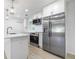 Modern kitchen featuring stainless steel appliances and white cabinets at 2975 Rollingwood Se Ln, Atlanta, GA 30316