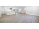 Bright and airy open-concept living space showcasing sleek floors and ample natural light at 2975 Rollingwood Se Ln, Atlanta, GA 30316