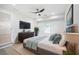 Cozy main bedroom with soft lighting, large window, and modern decor at 2975 Rollingwood Se Ln, Atlanta, GA 30316