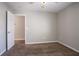 Neutral bedroom featuring plush carpeting and open entry for versatile decor options at 4567 Parkway Cir, Atlanta, GA 30349