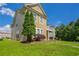 Charming two-story home featuring a well-kept lawn and inviting architecture, ideal for Gathering living at 4567 Parkway Cir, Atlanta, GA 30349