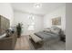 Staged bedroom with neutral colors and ample natural light at 4902 Pleasantry Way, Acworth, GA 30101