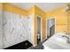 Bathroom featuring a modern shower, double sink vanity, and new tile at 507 Cross Creek Pt, Stone Mountain, GA 30087