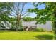 The property features a beautiful lake view from the backyard and a wooden dock on the water at 507 Cross Creek Pt, Stone Mountain, GA 30087