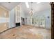 Bright living room with fireplace, skylights, and large arched windows, offering lots of natural light at 507 Cross Creek Pt, Stone Mountain, GA 30087
