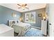 Comfortable bedroom featuring natural light and hardwood floors at 113 Westchester Xing, Canton, GA 30115