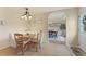 Cozy breakfast nook with built-in bench seating and a view into the dining room at 113 Westchester Xing, Canton, GA 30115