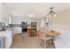 Functional kitchen with stainless steel appliances, center island, and breakfast nook at 113 Westchester Xing, Canton, GA 30115
