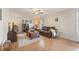 Cozy living room featuring hardwood floors and a comfortable sofa at 113 Westchester Xing, Canton, GA 30115