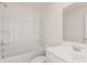 Bathroom features a shower/tub combo, toilet, and vanity at 1149 Blue Juniper Cir, Loganville, GA 30052