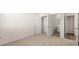 Neutral bedroom showcasing closet space, plus access to a bathroom at 1149 Blue Juniper Cir, Loganville, GA 30052