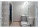 Bathroom featuring vanity with mirror and toilet at 4634 Garden Hills Dr, Stone Mountain, GA 30083