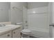 A classic bathroom design with a tub, toilet, and vanity at 4634 Garden Hills Dr, Stone Mountain, GA 30083