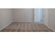 Spacious bedroom with neutral paint and carpet at 4634 Garden Hills Dr, Stone Mountain, GA 30083