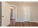 Bedroom with two doors and wood flooring at 7070 Ravenwood Ln, Lithonia, GA 30038