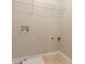 Laundry room with hookups and wire shelving at 7070 Ravenwood Ln, Lithonia, GA 30038