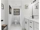 Stylish bathroom featuring a modern faucet and sink with art on the wall at 1066 Cleavemark Dr, Clarkston, GA 30021