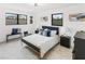 Beautiful bedroom featuring herringbone floors, large window views, and stylish decor at 1066 Cleavemark Dr, Clarkston, GA 30021