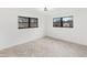 Well lit room with a modern light fixture, and herringbone flooring at 1066 Cleavemark Dr, Clarkston, GA 30021