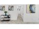 Clean and modern hallway with light wood floors and minimalist decor at 1066 Cleavemark Dr, Clarkston, GA 30021