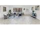 Spacious living room with modern decor, herringbone flooring, and natural light at 1066 Cleavemark Dr, Clarkston, GA 30021