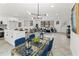 Bright, open layout features a dining area and kitchen with a view into the living room at 1066 Cleavemark Dr, Clarkston, GA 30021