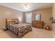 Cozy bedroom featuring carpet floors, ample natural light, and a view of the yard at 939 Bendleton Dr, Woodstock, GA 30188